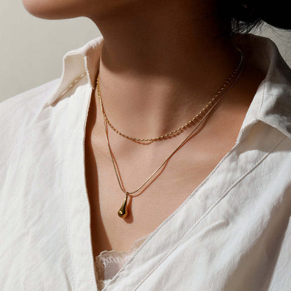 Minimalist Gold-Plated Teardrop Pendant Necklace – Elegant Layered Chain Design